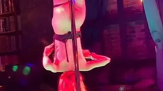 Striptease from a naked blonde with protruding nipples