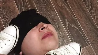 Slave licks the soles and shoes of the mistress