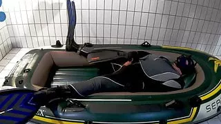Wetsuit, Fins and Boat - geared pup pawing off