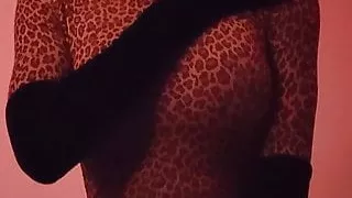 Leopard-print zentai girl enjoying her vibrator