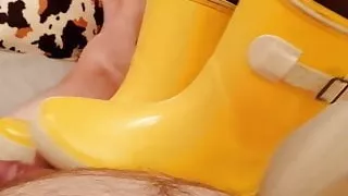 Footjob in Rubber Boots CBT