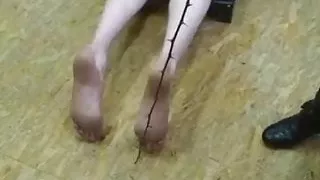 Waxing on the slaves body with sexy mistress in boots