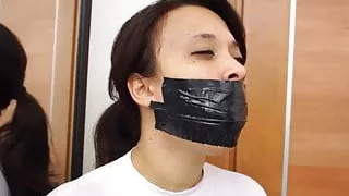 Fragiledesires – Tape Gagged and Tied in Tape Bondage