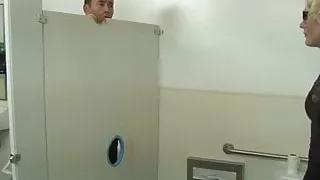 Cute shemale Isabella Sorrenti sucks big cock at gloryhole