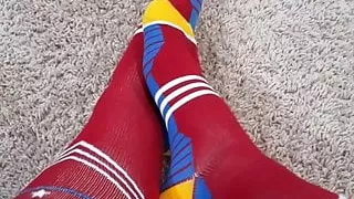 My feet and legs in superhero socks