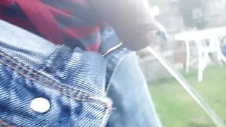 having a piss in the garden