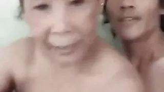 Touching mature boobs