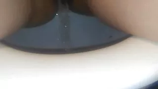 Girl pees and masturbates for a while 1