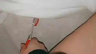 Playing with   sisters toothbrush