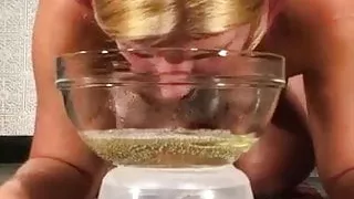 Wife drinks a full bowl of pee
