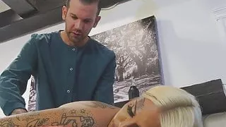 massaged inked transbabe teasing masseur with blowjob 