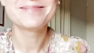 Brie Larson at home in a floral dress