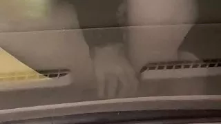 Solo female masturbation on hood of car