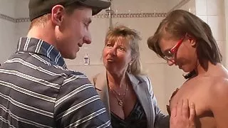 German swinger Petra Wegat in a bathroom threesome