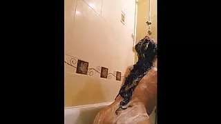 I am taking a warm shower naked