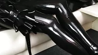 Mistress in black latex gets worshiped and fucked by slave
