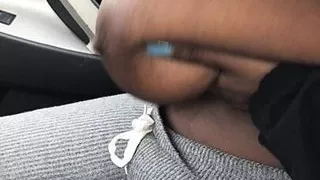 Ebony hoodrat takes tits out bra