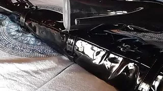 On a sofa wearing black sexy platform boots over the knees