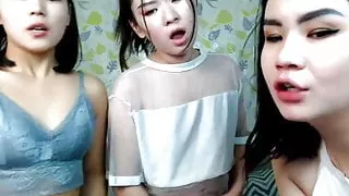 three pretty Japanese friends masturbating in living room