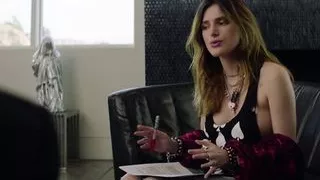 Bella Thorne shows some of her tits