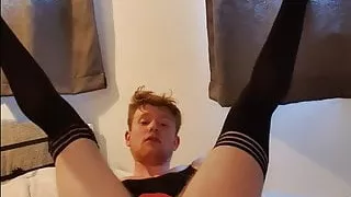 Young twink in mini skirt thong and stokings playing wit ass