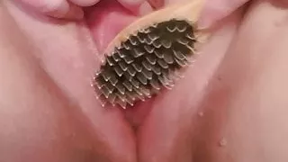 Pumped pussy fucked with brush