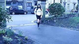 Transvestite outdoors in a park