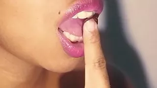Sexy mouth ebony pating with some grapes