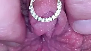Milf plays with huge pierced clit