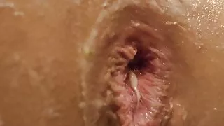 Sloppy close up anal toying with cream