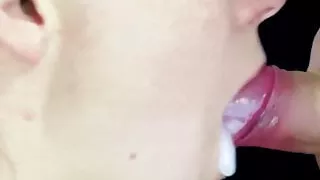 Sensual blowjob with cum in mouth. Close-up.