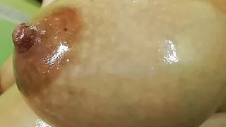 Big lactating boobs – side view