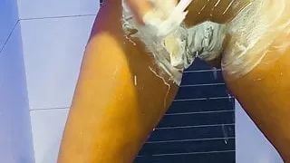 Shaving pussy in the shower