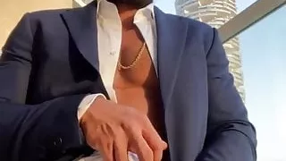 Muscle hunk shows off his thick uncut cock