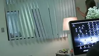 Busty employee gives head to big cock