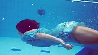 Sexy tight teen Marusia swims naked underwater