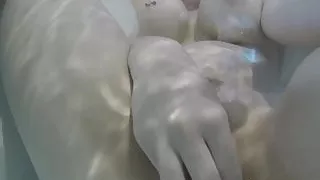 Nadia takes a bath with some rubber duckies