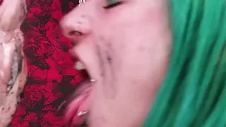 Girl licks dirty feet of a friend