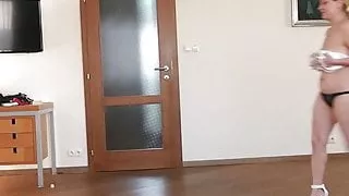 Natasha walks in white heels on widescreen