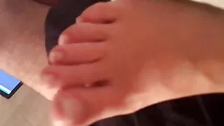 best girlfriend  shows her sexy feet pedicured toes