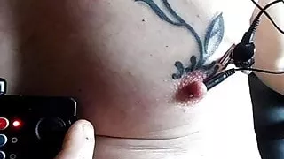 E-stim directly inside pierced nipple