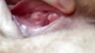 My girlfriend fingering her hairy pussy