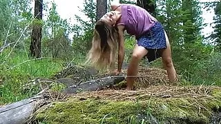 Hairy girl masturbating in nature