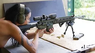 Daniela Kostic, Playboy girl with a big gun