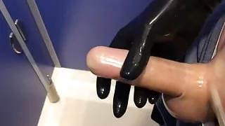 Quick wank at the shopping mall toilet with rubber gloves
