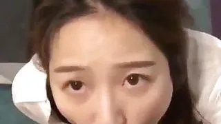 cute Asian gives blowjob in store