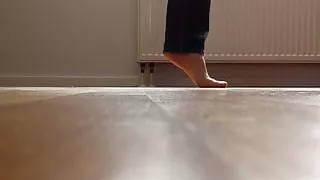 Hopping on one naked foot