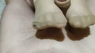 Footjob nylon socks big cumshot