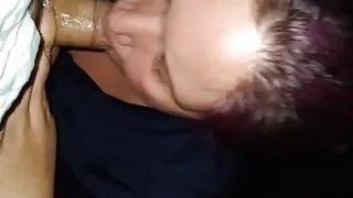 Purple haired BBW milf sucks cock outdoors