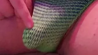 Playing with my bulge in a green and blue man thong